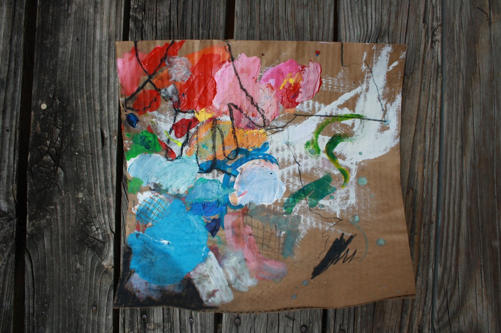 Paint and colors and charcoal on warped cardboard.