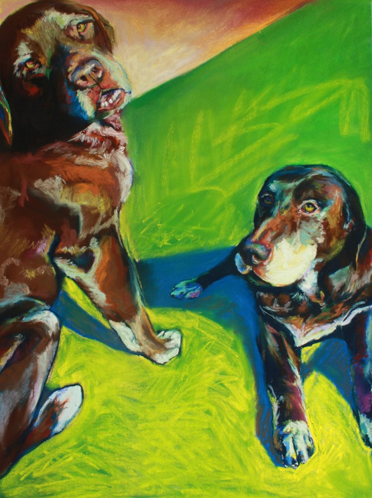 Mom dog and son dog basking.